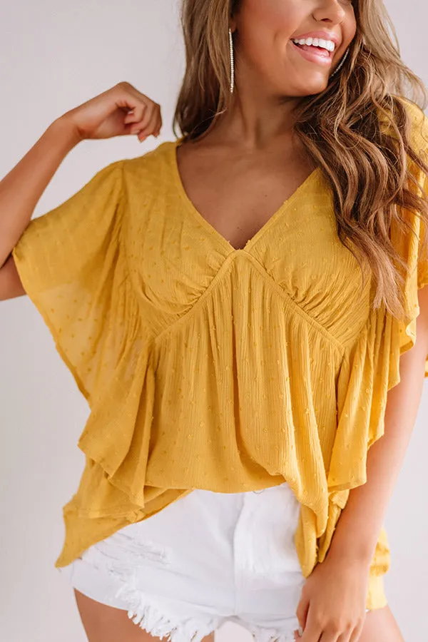 Ahead Of The Curve Babydoll Top In Marigold