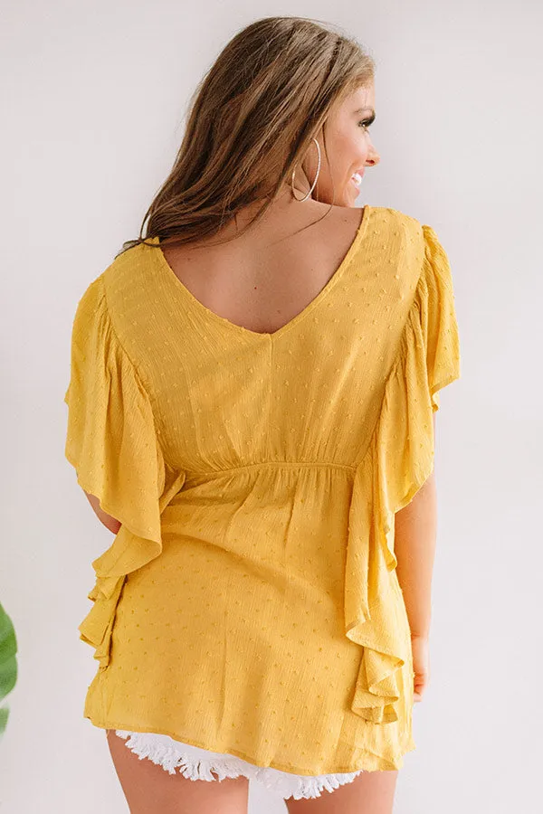 Ahead Of The Curve Babydoll Top In Marigold