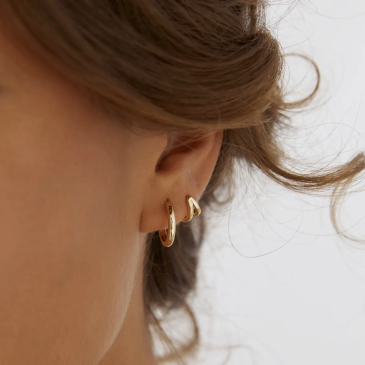 Jean Gold Huggie Earrings